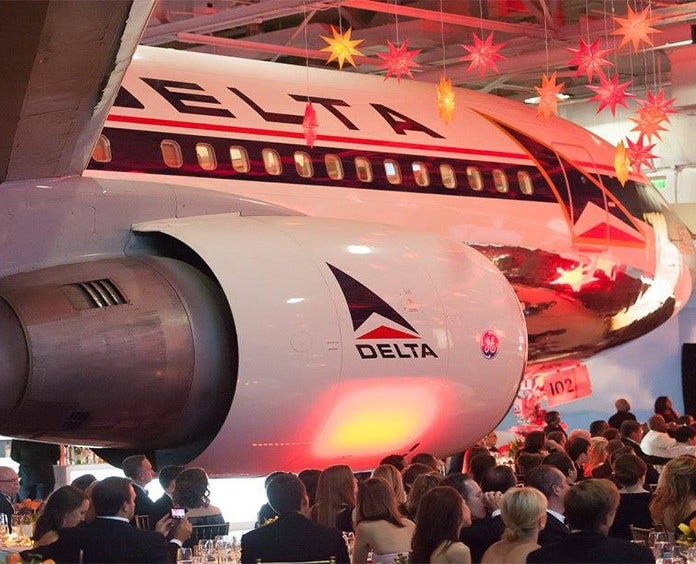 Delta airplane inside hanger at the Delta Hope Ball event