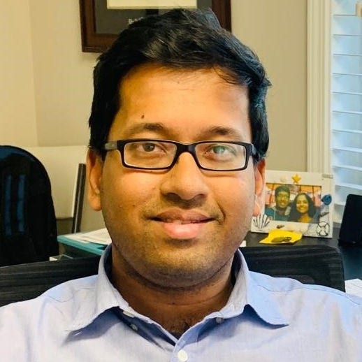 headshot of Parichoy Pal Choudhury, PhD