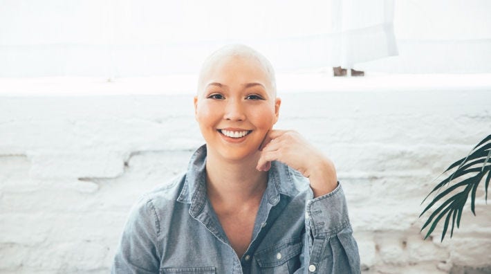 Anna Wassman, breast cancer survivor, smiles for a photo