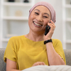 woman smiling while talking on phone