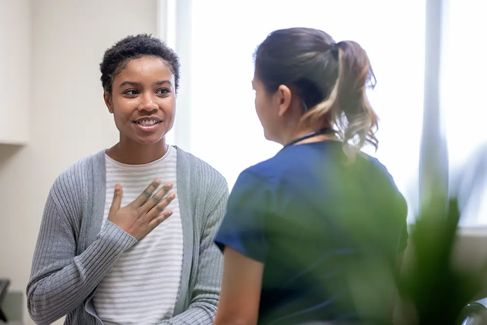 patient talks to medical staff