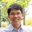 Asian man in front of trees shirt with collar and glasses