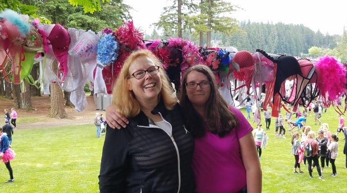 Nora Disis, MD, and her daughter at the finish line of the Bra Dash to benefit breast cancer research