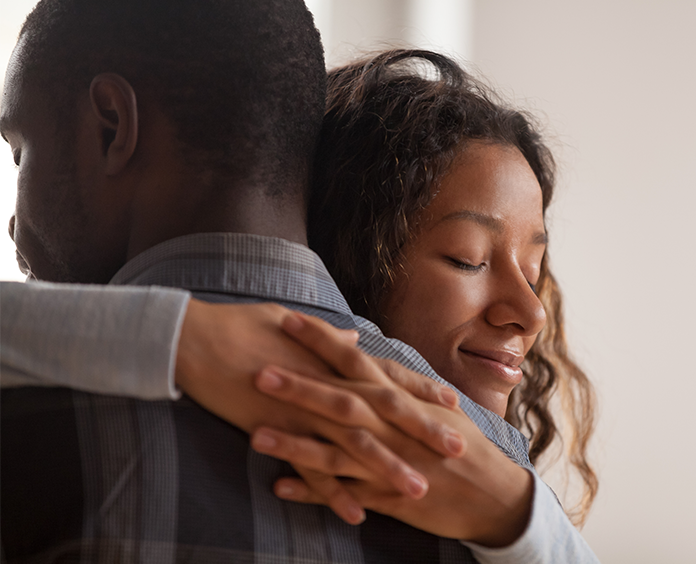 woman hugging man