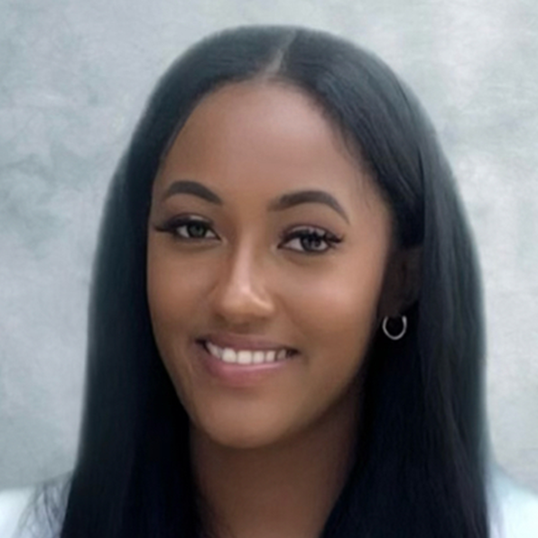 Headshot of researcher Aliyah Green, BS, long black hair, white blouse. 