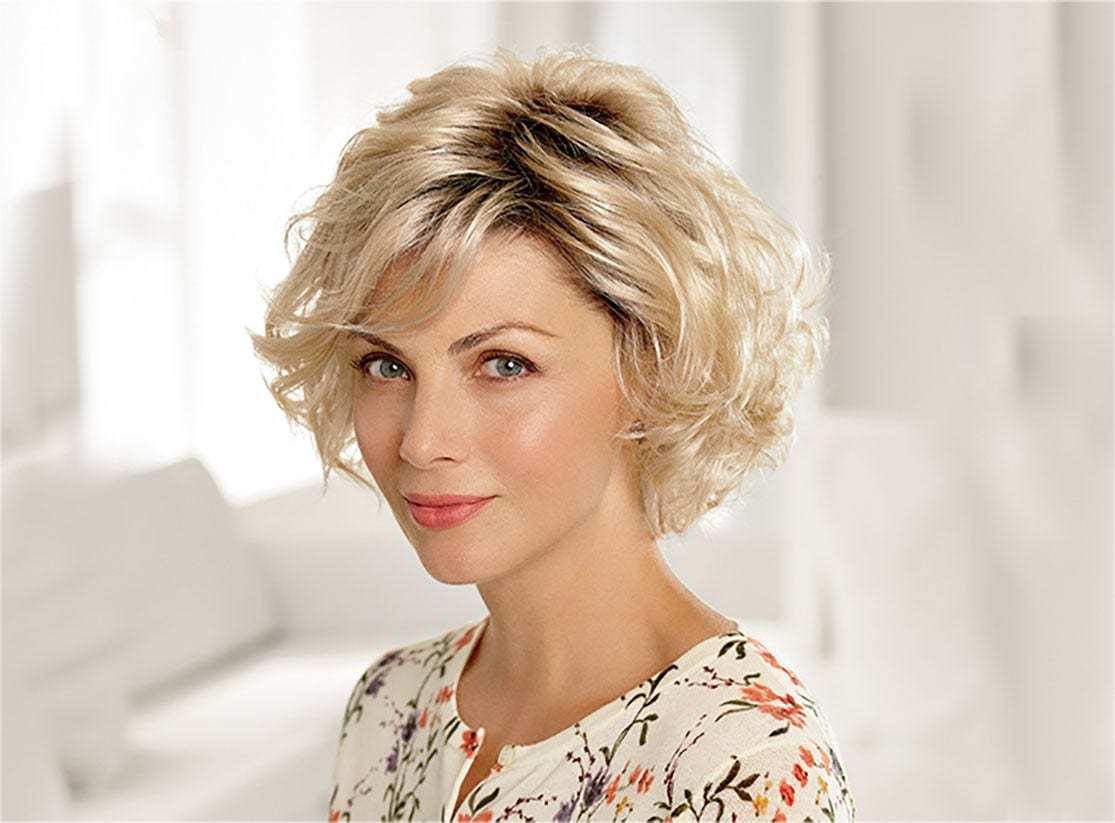 caucasian woman wearing blonde wig