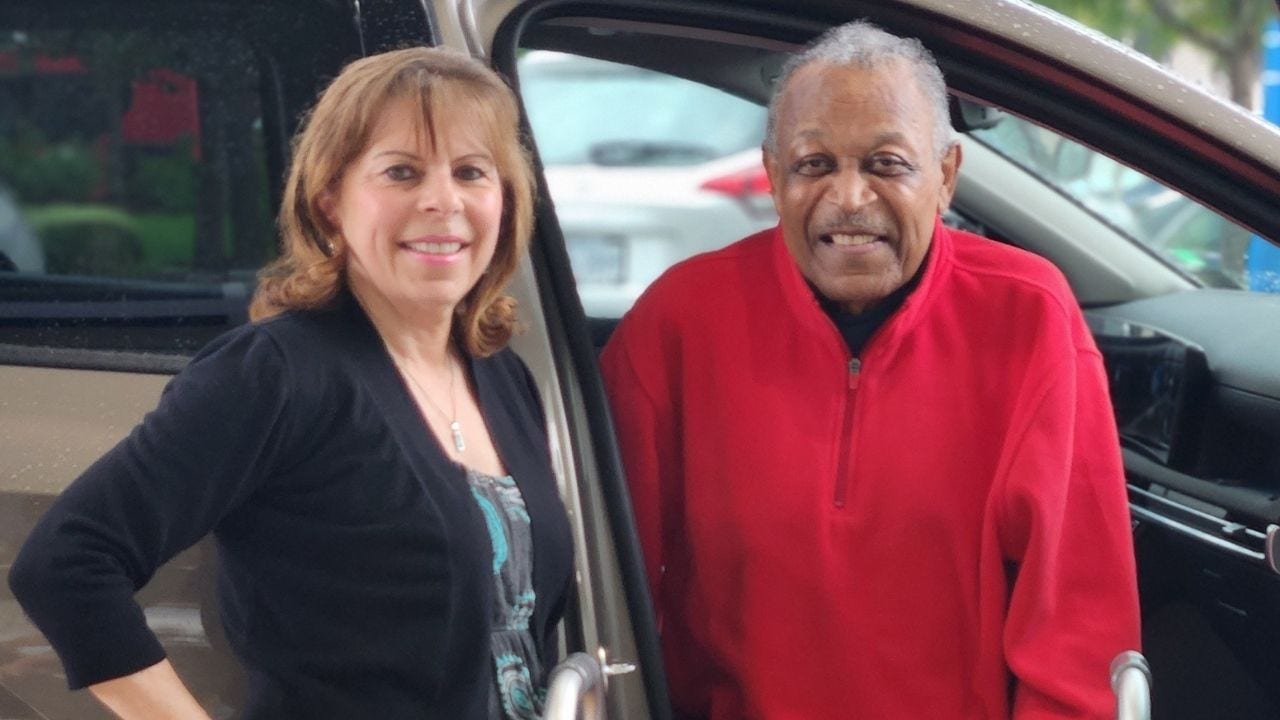 Darlene Parker, left, with her Road To Recovery passenger Michael Coleman. 