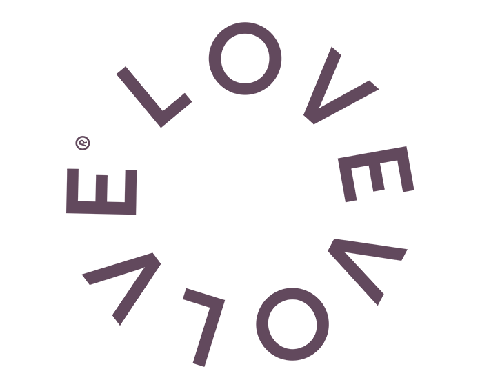 LovEvolve logo arranged in circular purple text design.