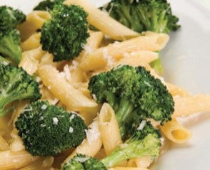 close up of a dish of broccoli, garlic, and lemon penne pasta