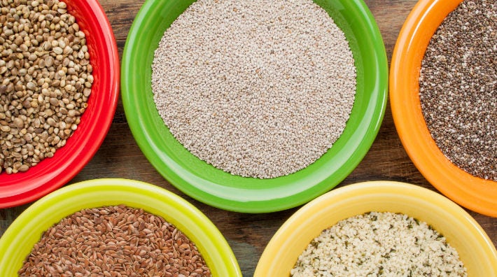 diverse group of women stretch before exercise