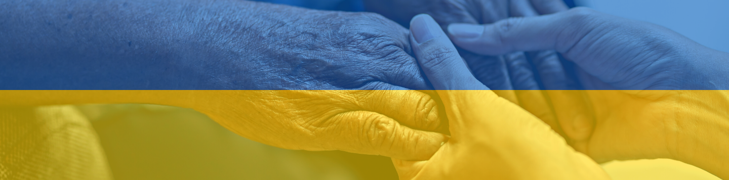 female hands holding elderly woman's hands with Ukrainian flag color overlay