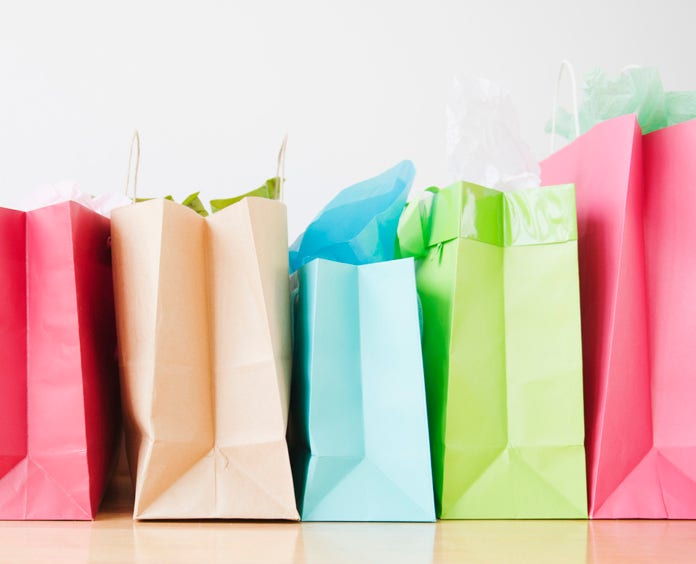 <p>Colorful shopping bags standing in row</p>
