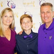 Cole Eicher with his mother and father