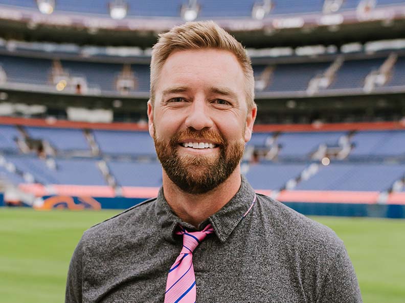 white man standing on baseball field