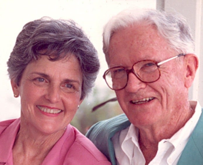 elderly couple smiling together