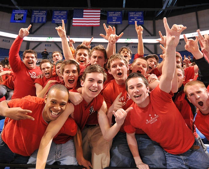 Coaches vs Cancer basketball fans cheering