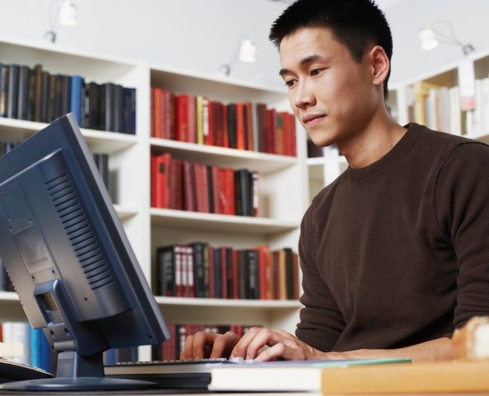 Low angle view of a businessman using a computer