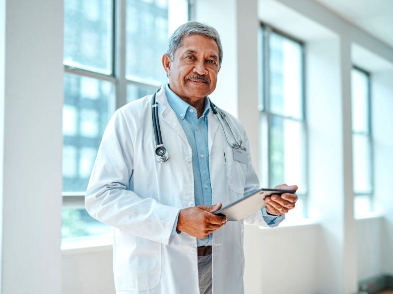 male doctor standing in hallway