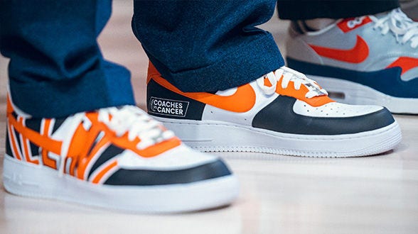 Colorful Nike sneakers with Coaches vs. Cancer label.