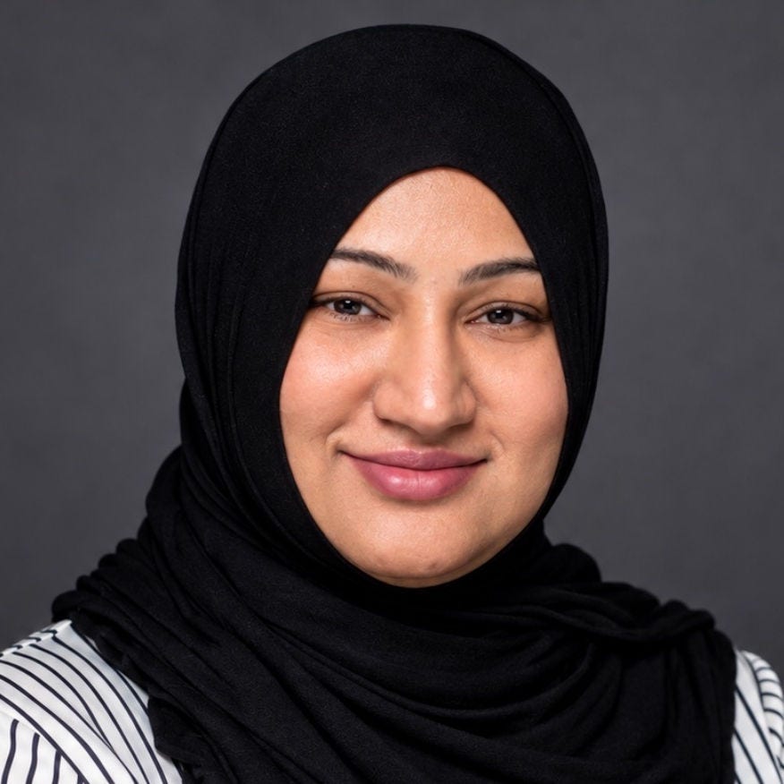 Headshot of Laraib Mazhar, DrPH, in a black and white striped blouse and black hijab