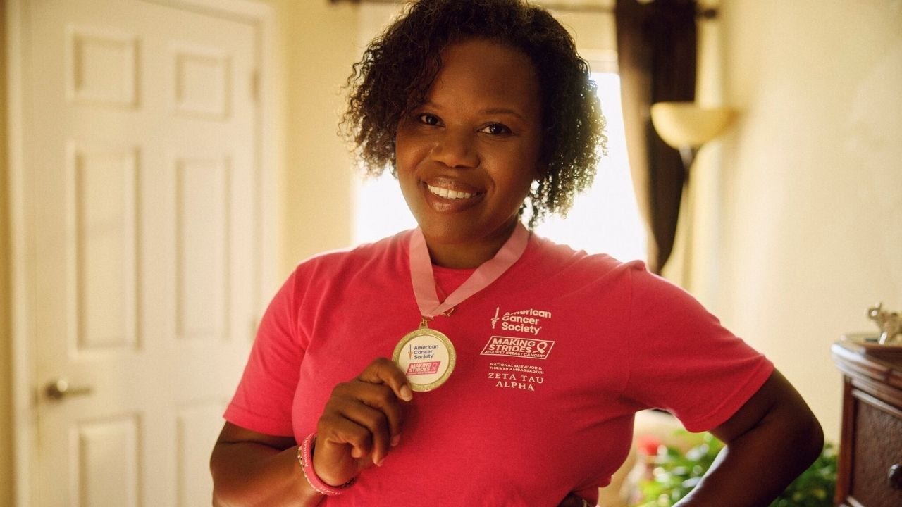 Roni PeGee wears her Making Strides medal
