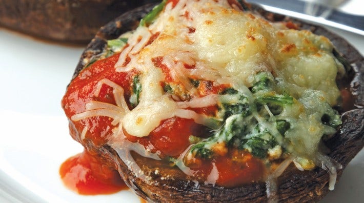 image of Spinach-Ricotta Stuffed Portobello Caps from the ACS cookbook, "Quick and Healthy: 50 Simple Delicious Recipes for Every Day"