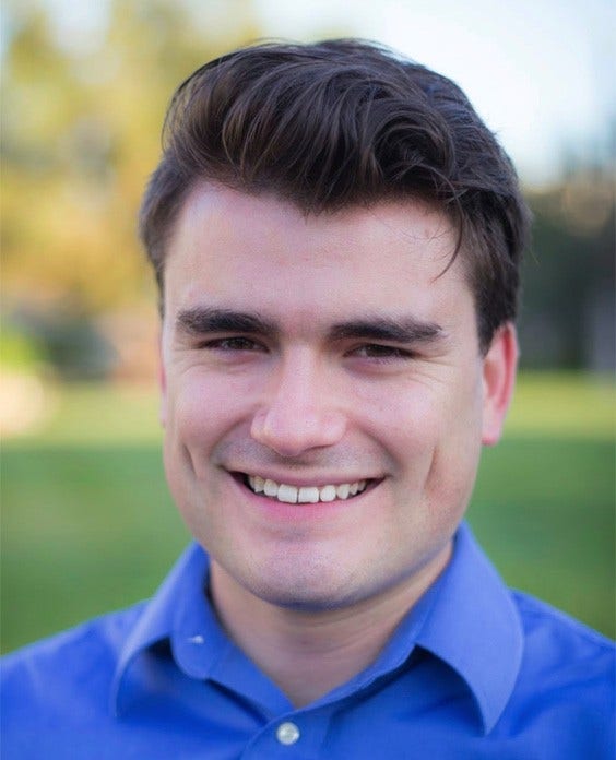 white man wearing blue dress shirt