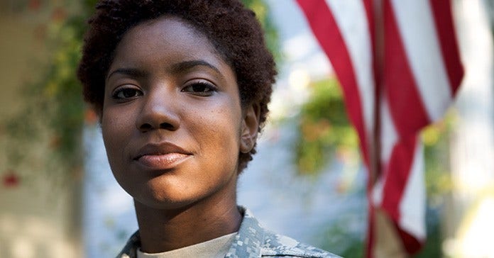 Military woman looking at camera