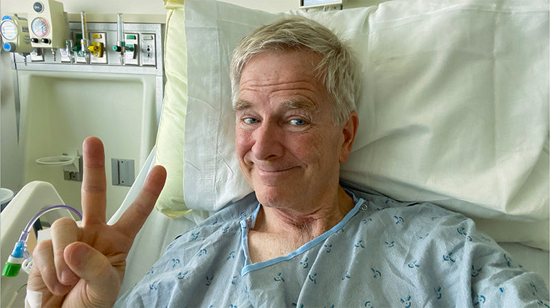Image of Rick Steves in a hospital gown