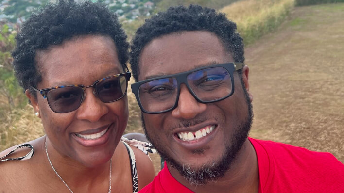 Smiling couple taking a selfie outdoors