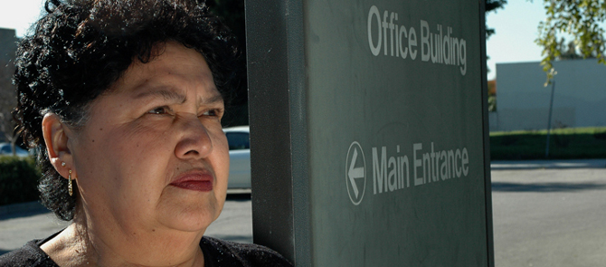 middle aged woman looking concerned