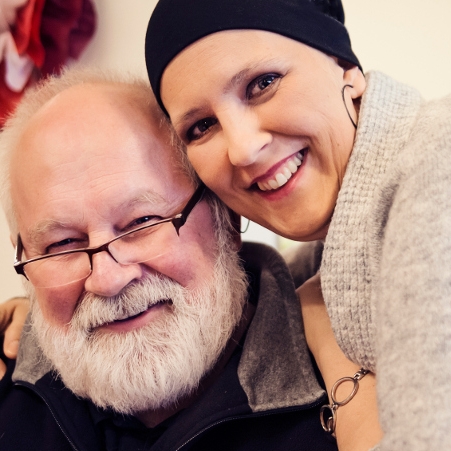 Smiling Woman in Headscarf with Husband