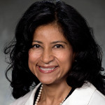 close up portrait of Carmen E. Guerra, MD