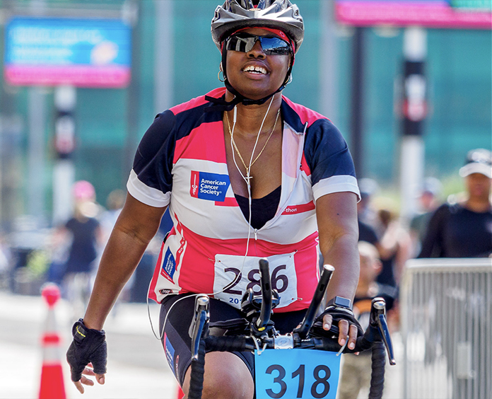 Determination participant on a bike