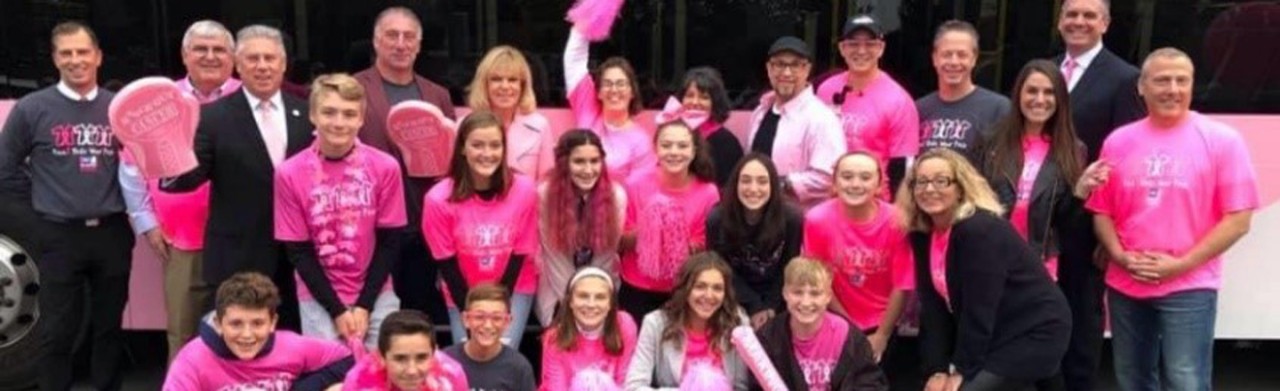 youth group wearing pink shirts 