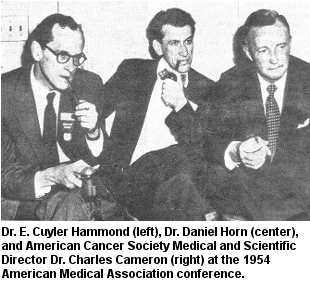 black and white photo of Dr. E. Cuyler Hammond, Dr. Daniel Horn, and American Cancer Society Medical and Scientific Director Dr. Charles Cameron at the 1954 American Medical Association conference.